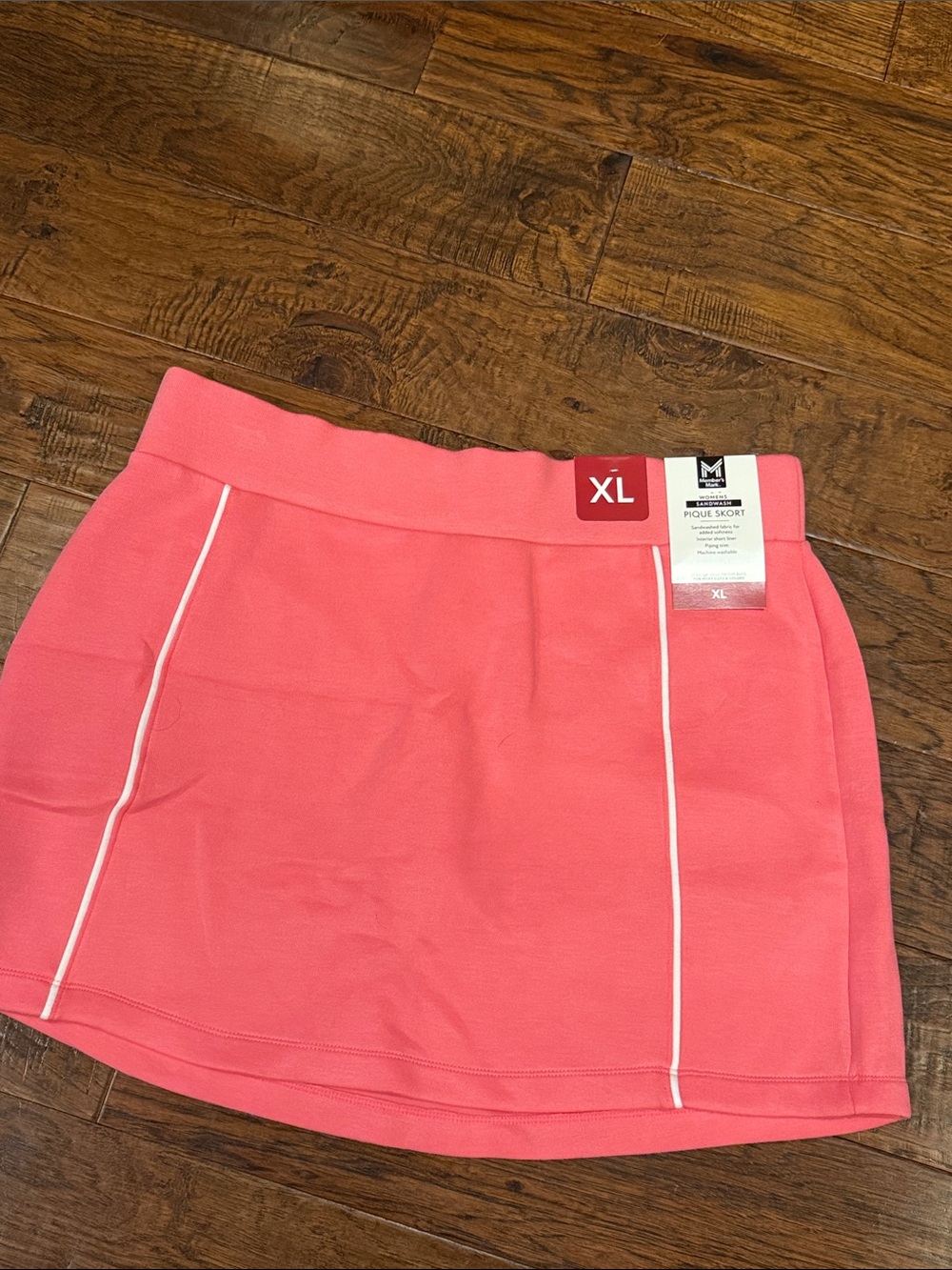 Members mark Coral Mini Skort with White Piping